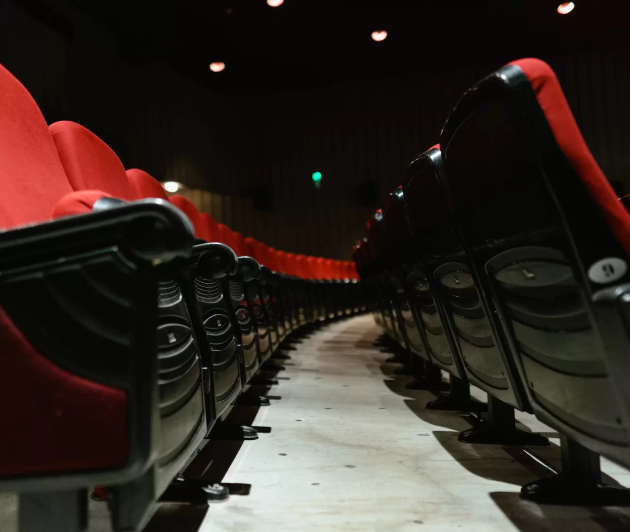 cinema red seats - Bitwen Ali